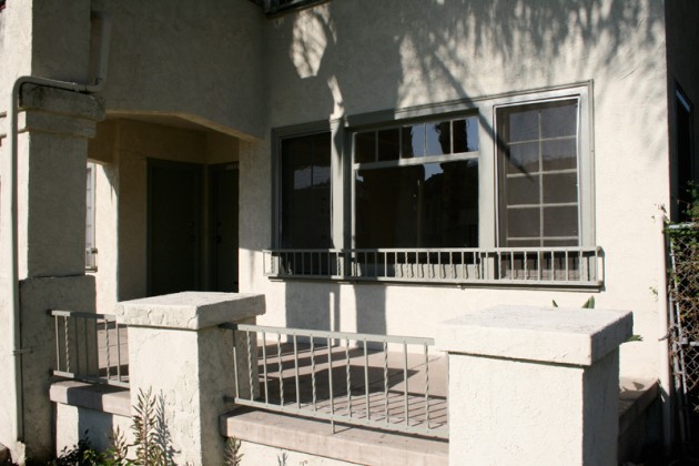 Fabulous Find: MIRACLE MILE Beautiful Duplex Surrounded by Windows, Fireplace